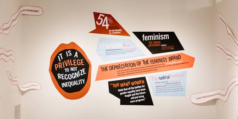 Colorful art mounted on a wall.