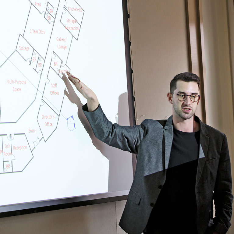 A person gives a presentation.