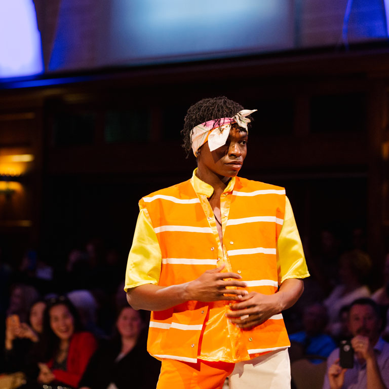 A model poses on the runway.