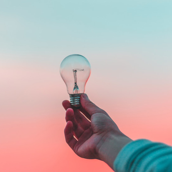 Students smile together on the runway.