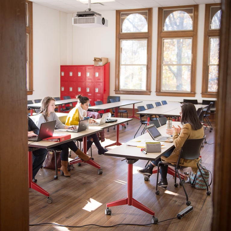 People sitting in a classroom working