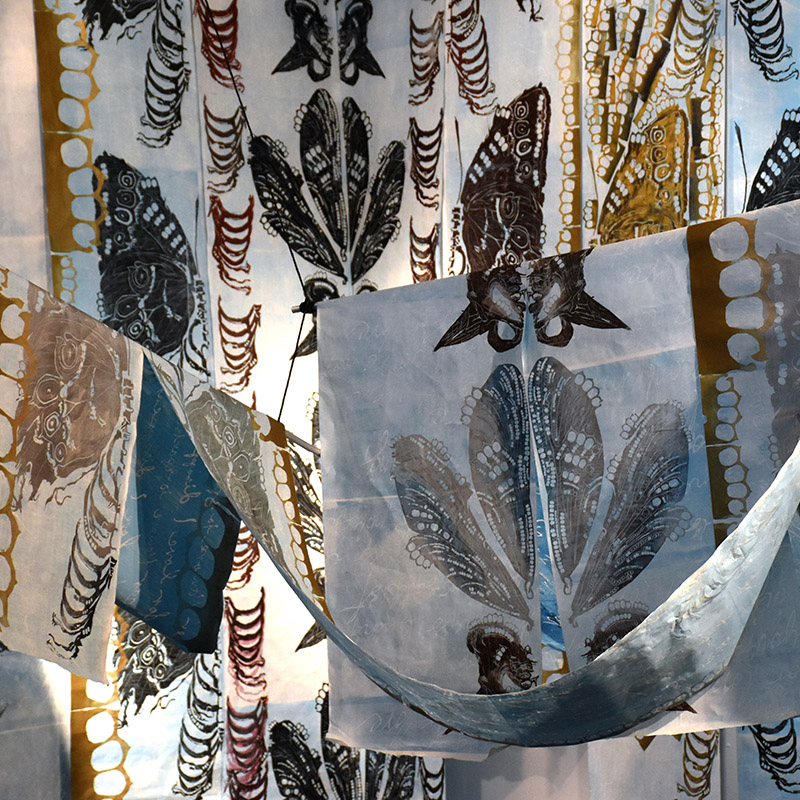 Fabric drapes from the ceiling.