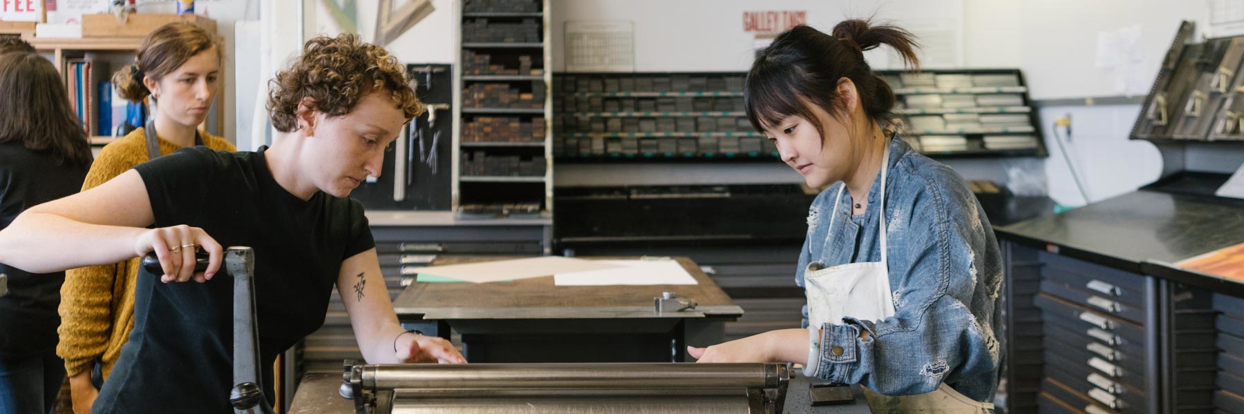 Students working on the letterpress.