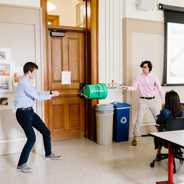 Two students present a project. 